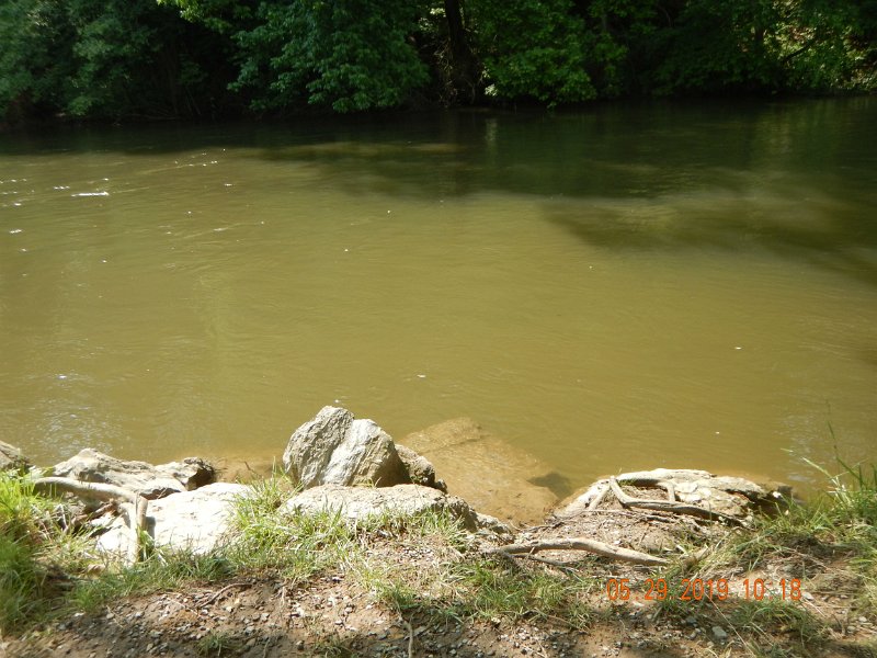 $YellowBreeches1012$.jpg - Again, another pic of high water.  Didn't see a fish rise but there were a couple of caddis on the water.