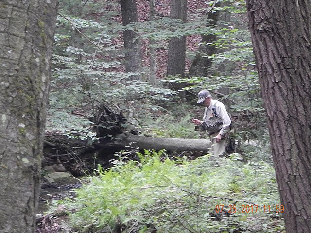 DSCN2243.jpg -                                Ed trying to find a spot to drop a fly.