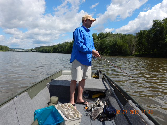 DSCN2159.jpg -                   Gary fishing in the front of the boat.             
