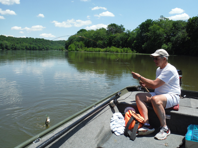 DSCF9668.jpg - Weather warmed and the sweat shirt came off.  Fish were still biting.
