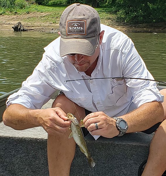 $Juniata1011$ (2).jpg - Gary getting one unhooked.