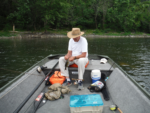 DSCF9455.jpg - Getting the hook out and letting it go.