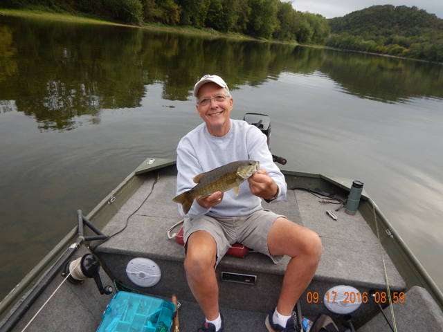 DSCN1680.jpg -              Me with a shit eatin' grin.  That was probably the biggest of the day but I lost a larger one.                  