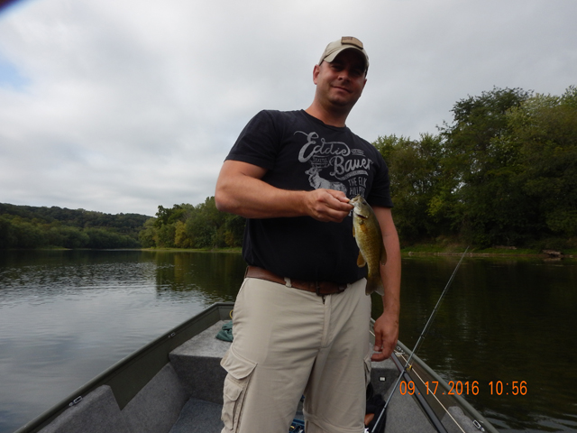 DSCN1701.jpg -                     There you go.  A good fish held just right for the camera.           