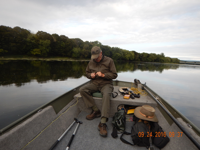 DSCN1712.jpg - Ed, fiddling with stuff.  Changing lures and such.                               