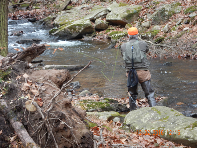 DSCN1802.jpg - Ed trying a really nice run.  Orange hats were a must...it's still rifle season for deer.                               