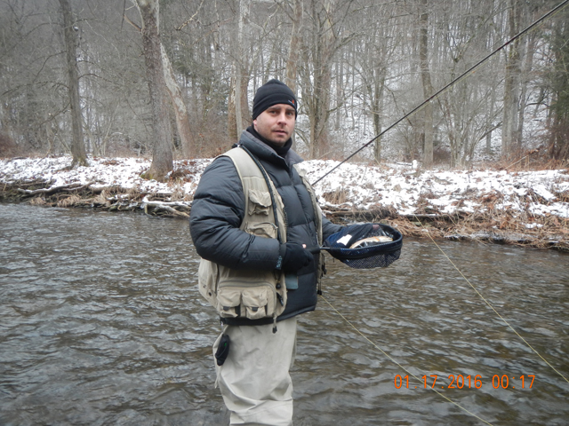 DSCN1605.jpg -                                Here he is with the brookie.