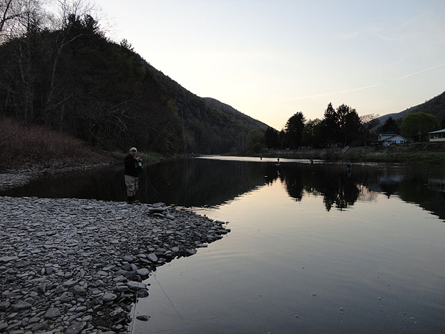 DSC00680.jpg -                                Daylight fading and Steve fishing the Pine.