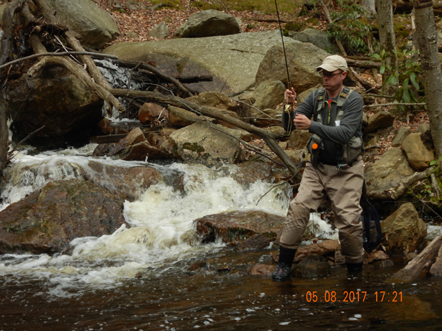 DSCN1979.jpg - Gary has one on.  Note the face of concentration.  Like....I don't wanta lose this fish!                               