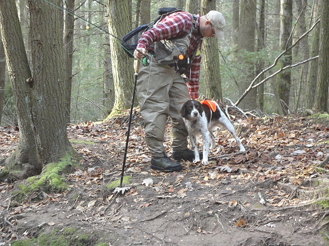 DSC01345.jpg -                                Gary E with Remy at stream side.