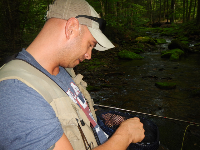 DSCN0178.jpg -                                At least he didn't harm the little guy too badly and let it swim away.